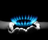 7708392-hands-holding-a-flame-gas.jpg